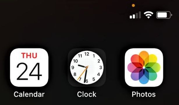 orange dot on iphone screen